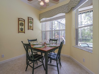 This exceptional 3-bedroom, 2-bathroom screened Pool home with on Champions Club at Summerfield in Florida - for sale on GolfHomes.com, golf home, golf lot