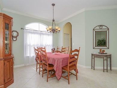 This exceptional 3-bedroom, 2-bathroom screened Pool home with on Champions Club at Summerfield in Florida - for sale on GolfHomes.com, golf home, golf lot