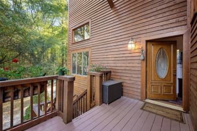 Nestled on a sprawling private lot, this enchanting on Sapphire National Golf Club in North Carolina - for sale on GolfHomes.com, golf home, golf lot