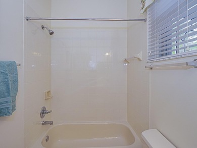 This exceptional 3-bedroom, 2-bathroom screened Pool home with on Champions Club at Summerfield in Florida - for sale on GolfHomes.com, golf home, golf lot