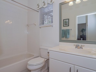This exceptional 3-bedroom, 2-bathroom screened Pool home with on Champions Club at Summerfield in Florida - for sale on GolfHomes.com, golf home, golf lot