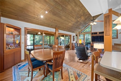 Nestled on a sprawling private lot, this enchanting on Sapphire National Golf Club in North Carolina - for sale on GolfHomes.com, golf home, golf lot