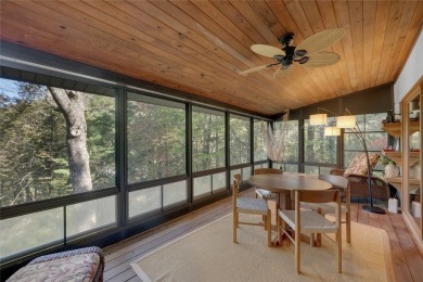 Nestled on a sprawling private lot, this enchanting on Sapphire National Golf Club in North Carolina - for sale on GolfHomes.com, golf home, golf lot