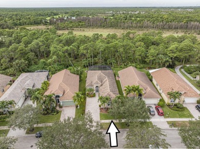 This exceptional 3-bedroom, 2-bathroom screened Pool home with on Champions Club at Summerfield in Florida - for sale on GolfHomes.com, golf home, golf lot