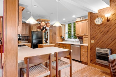 Nestled on a sprawling private lot, this enchanting on Sapphire National Golf Club in North Carolina - for sale on GolfHomes.com, golf home, golf lot