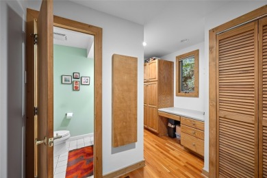 Nestled on a sprawling private lot, this enchanting on Sapphire National Golf Club in North Carolina - for sale on GolfHomes.com, golf home, golf lot