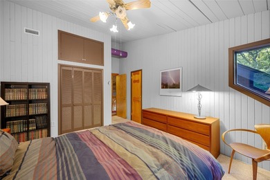 Nestled on a sprawling private lot, this enchanting on Sapphire National Golf Club in North Carolina - for sale on GolfHomes.com, golf home, golf lot