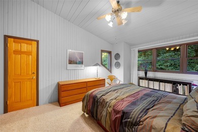 Nestled on a sprawling private lot, this enchanting on Sapphire National Golf Club in North Carolina - for sale on GolfHomes.com, golf home, golf lot