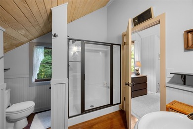 Nestled on a sprawling private lot, this enchanting on Sapphire National Golf Club in North Carolina - for sale on GolfHomes.com, golf home, golf lot