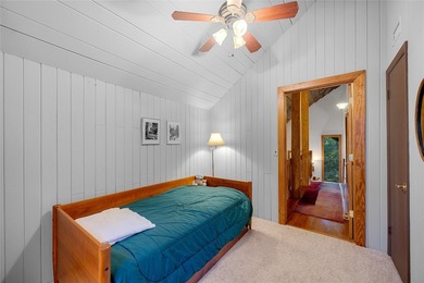 Nestled on a sprawling private lot, this enchanting on Sapphire National Golf Club in North Carolina - for sale on GolfHomes.com, golf home, golf lot