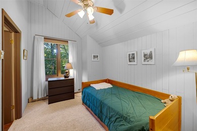 Nestled on a sprawling private lot, this enchanting on Sapphire National Golf Club in North Carolina - for sale on GolfHomes.com, golf home, golf lot