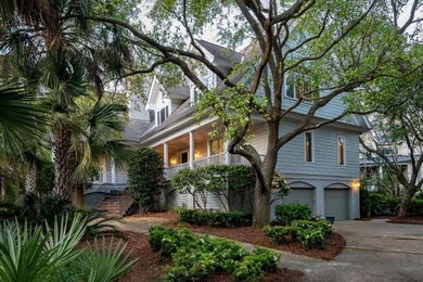 Set on a generous, level homesite overlooking a tranquil lagoon on Kiawah Island Resort - Cougar Point in South Carolina - for sale on GolfHomes.com, golf home, golf lot