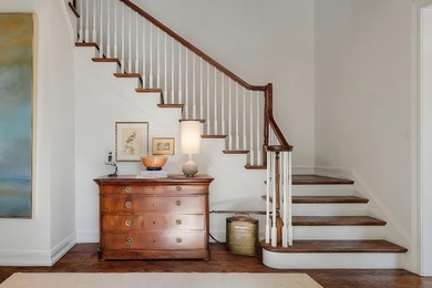 Set on a generous, level homesite overlooking a tranquil lagoon on Kiawah Island Resort - Cougar Point in South Carolina - for sale on GolfHomes.com, golf home, golf lot