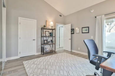 Discover refined living in this end unit gated townhome in Los on Los Robles Greens Golf Course in California - for sale on GolfHomes.com, golf home, golf lot