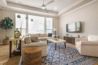 Beautifully landscaped single-story home with an inviting open on Wildhorse Golf Club of Robson Ranch in Texas - for sale on GolfHomes.com, golf home, golf lot