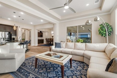 Beautifully landscaped single-story home with an inviting open on Wildhorse Golf Club of Robson Ranch in Texas - for sale on GolfHomes.com, golf home, golf lot