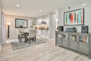 Discover refined living in this end unit gated townhome in Los on Los Robles Greens Golf Course in California - for sale on GolfHomes.com, golf home, golf lot