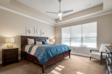 Beautifully landscaped single-story home with an inviting open on Wildhorse Golf Club of Robson Ranch in Texas - for sale on GolfHomes.com, golf home, golf lot