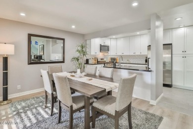 Discover refined living in this end unit gated townhome in Los on Los Robles Greens Golf Course in California - for sale on GolfHomes.com, golf home, golf lot