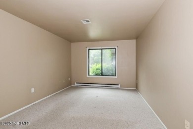 Welcome Home to Covered Bridge II! This fantastic end unit on Pine Brook Golf Course in New Jersey - for sale on GolfHomes.com, golf home, golf lot