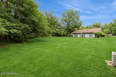 Welcome Home to Covered Bridge II! This fantastic end unit on Pine Brook Golf Course in New Jersey - for sale on GolfHomes.com, golf home, golf lot