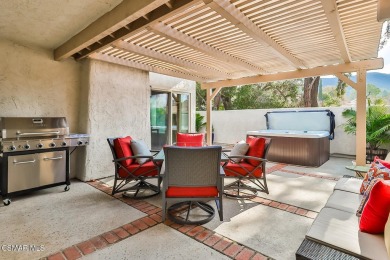 Discover refined living in this end unit gated townhome in Los on Los Robles Greens Golf Course in California - for sale on GolfHomes.com, golf home, golf lot