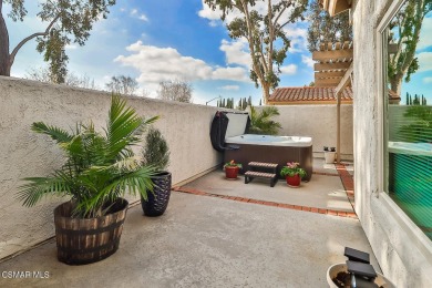 Discover refined living in this end unit gated townhome in Los on Los Robles Greens Golf Course in California - for sale on GolfHomes.com, golf home, golf lot