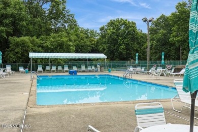 Welcome Home to Covered Bridge II! This fantastic end unit on Pine Brook Golf Course in New Jersey - for sale on GolfHomes.com, golf home, golf lot