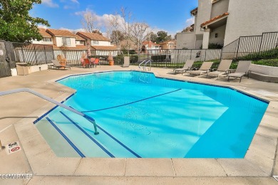 Discover refined living in this end unit gated townhome in Los on Los Robles Greens Golf Course in California - for sale on GolfHomes.com, golf home, golf lot