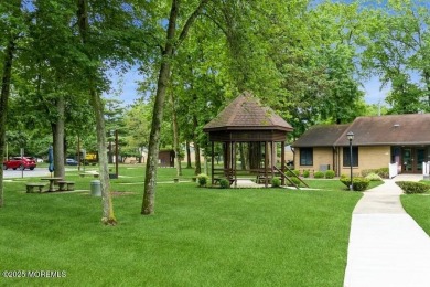 Welcome Home to Covered Bridge II! This fantastic end unit on Pine Brook Golf Course in New Jersey - for sale on GolfHomes.com, golf home, golf lot
