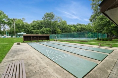 Welcome Home to Covered Bridge II! This fantastic end unit on Pine Brook Golf Course in New Jersey - for sale on GolfHomes.com, golf home, golf lot