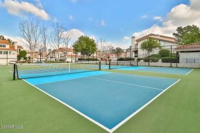 Discover refined living in this end unit gated townhome in Los on Los Robles Greens Golf Course in California - for sale on GolfHomes.com, golf home, golf lot