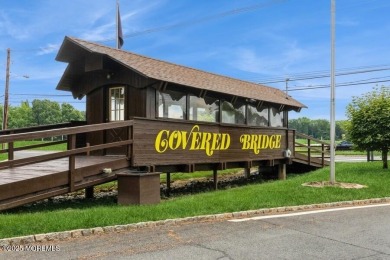 Welcome Home to Covered Bridge II! This fantastic end unit on Pine Brook Golf Course in New Jersey - for sale on GolfHomes.com, golf home, golf lot