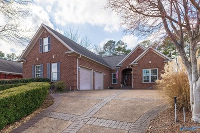 This luxury home overlooks the #4 fairway of Canebrake with a on Canebrake Golf Club in Alabama - for sale on GolfHomes.com, golf home, golf lot