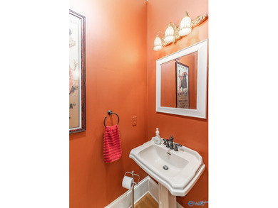 This luxury home overlooks the #4 fairway of Canebrake with a on Canebrake Golf Club in Alabama - for sale on GolfHomes.com, golf home, golf lot