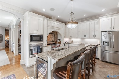 This luxury home overlooks the #4 fairway of Canebrake with a on Canebrake Golf Club in Alabama - for sale on GolfHomes.com, golf home, golf lot