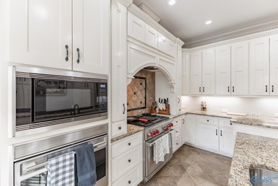 This luxury home overlooks the #4 fairway of Canebrake with a on Canebrake Golf Club in Alabama - for sale on GolfHomes.com, golf home, golf lot