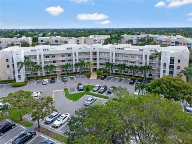 Beautifully renovated apartment seamlessly blends modern designs on Sunrise Lakes Phase IV Golf Course in Florida - for sale on GolfHomes.com, golf home, golf lot