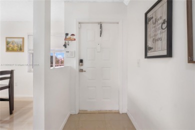 Beautifully renovated apartment seamlessly blends modern designs on Sunrise Lakes Phase IV Golf Course in Florida - for sale on GolfHomes.com, golf home, golf lot
