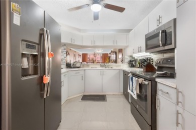 Beautifully renovated apartment seamlessly blends modern designs on Sunrise Lakes Phase IV Golf Course in Florida - for sale on GolfHomes.com, golf home, golf lot