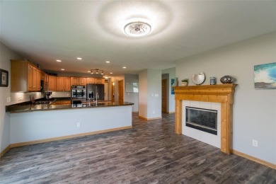 This beautiful 2-story home overlooks the par-3 4th hole at on Hunters Ridge Golf Course in Iowa - for sale on GolfHomes.com, golf home, golf lot