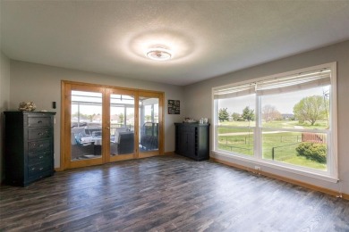 This beautiful 2-story home overlooks the par-3 4th hole at on Hunters Ridge Golf Course in Iowa - for sale on GolfHomes.com, golf home, golf lot