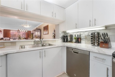 Beautifully renovated apartment seamlessly blends modern designs on Sunrise Lakes Phase IV Golf Course in Florida - for sale on GolfHomes.com, golf home, golf lot