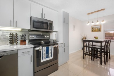 Beautifully renovated apartment seamlessly blends modern designs on Sunrise Lakes Phase IV Golf Course in Florida - for sale on GolfHomes.com, golf home, golf lot