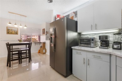 Beautifully renovated apartment seamlessly blends modern designs on Sunrise Lakes Phase IV Golf Course in Florida - for sale on GolfHomes.com, golf home, golf lot