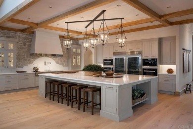 A masterful expression of timeless French country elegance on Rancho Santa Fe Golf Club in California - for sale on GolfHomes.com, golf home, golf lot