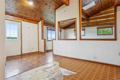 Endless Potential! Fixer-Upper Opportunity Close to Lake on Lake McBride Golf Course in Iowa - for sale on GolfHomes.com, golf home, golf lot
