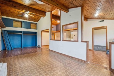 Endless Potential! Fixer-Upper Opportunity Close to Lake on Lake McBride Golf Course in Iowa - for sale on GolfHomes.com, golf home, golf lot