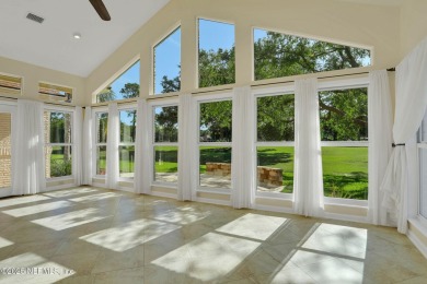 ''Sandwedged'' between the 11th and 12th holes, this Country on Jacksonville Golf and Country Club in Florida - for sale on GolfHomes.com, golf home, golf lot