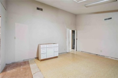 Endless Potential! Fixer-Upper Opportunity Close to Lake on Lake McBride Golf Course in Iowa - for sale on GolfHomes.com, golf home, golf lot